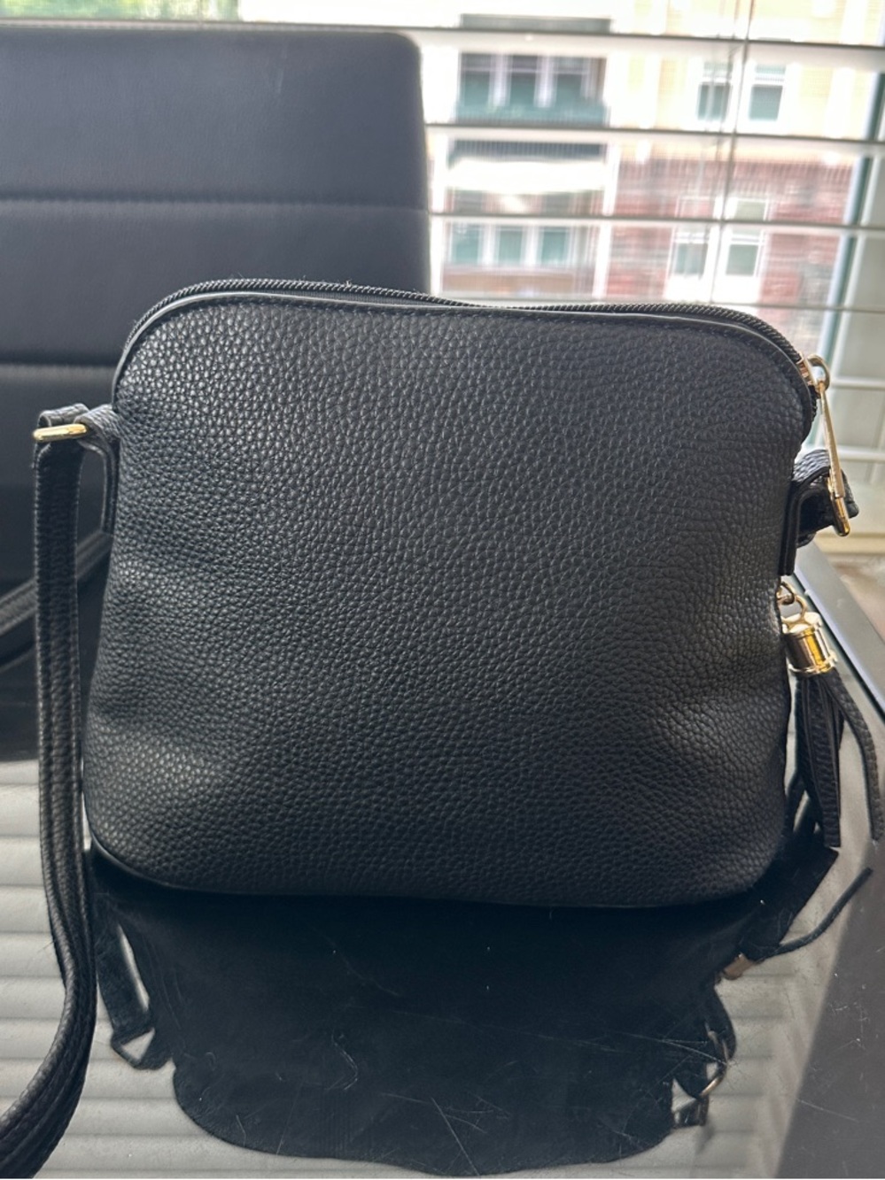 Black Pebbled Crossbody Bag with Tassel Zip Accent - Picture 2 of 2